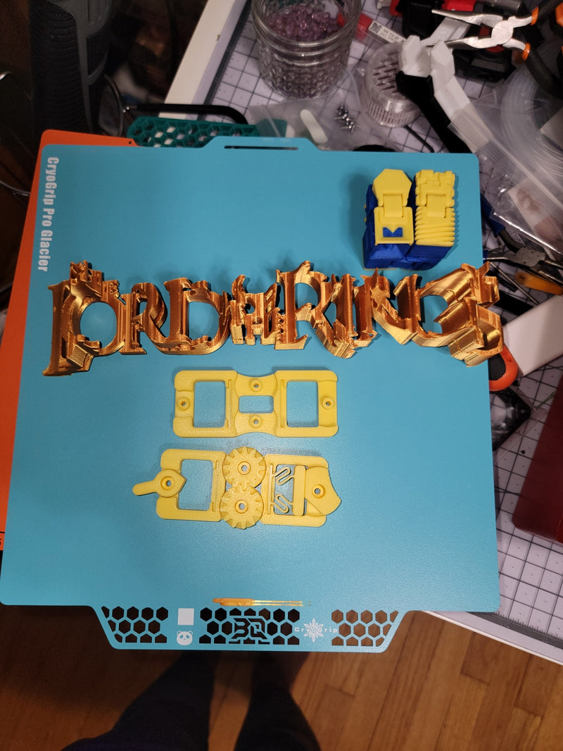 Lord of the Rings logo and a couple of fidgets.